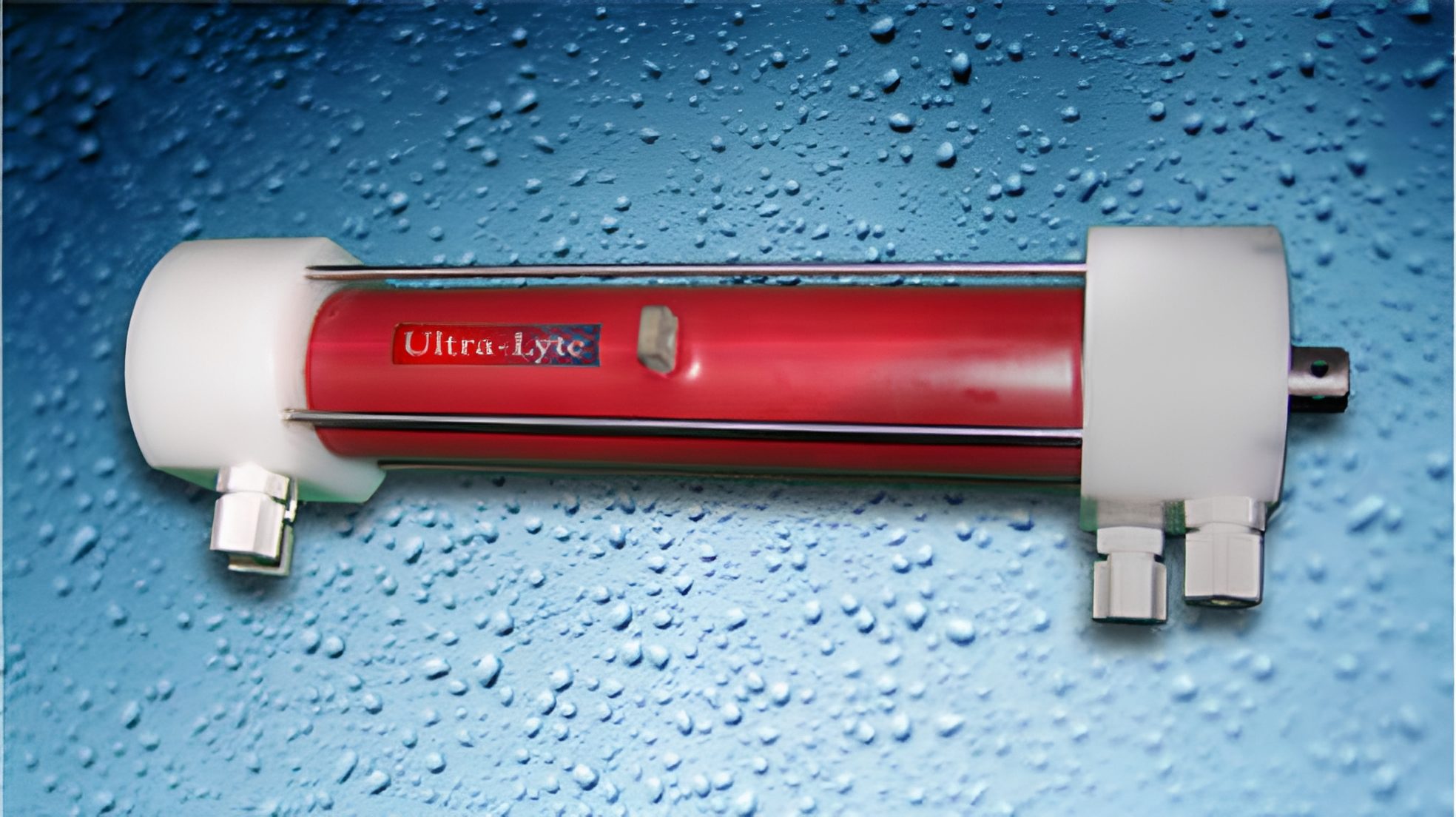 Cylindrical tool against blue, textured background.