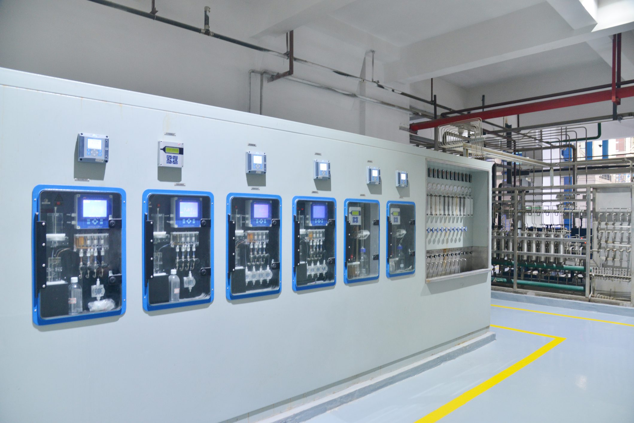 Industrial control panel with multiple displays.